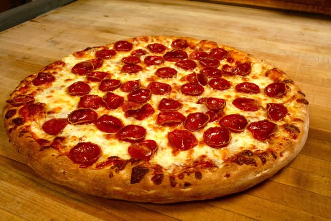 Indian-style fusion pizza at City South Pizza Winnipeg