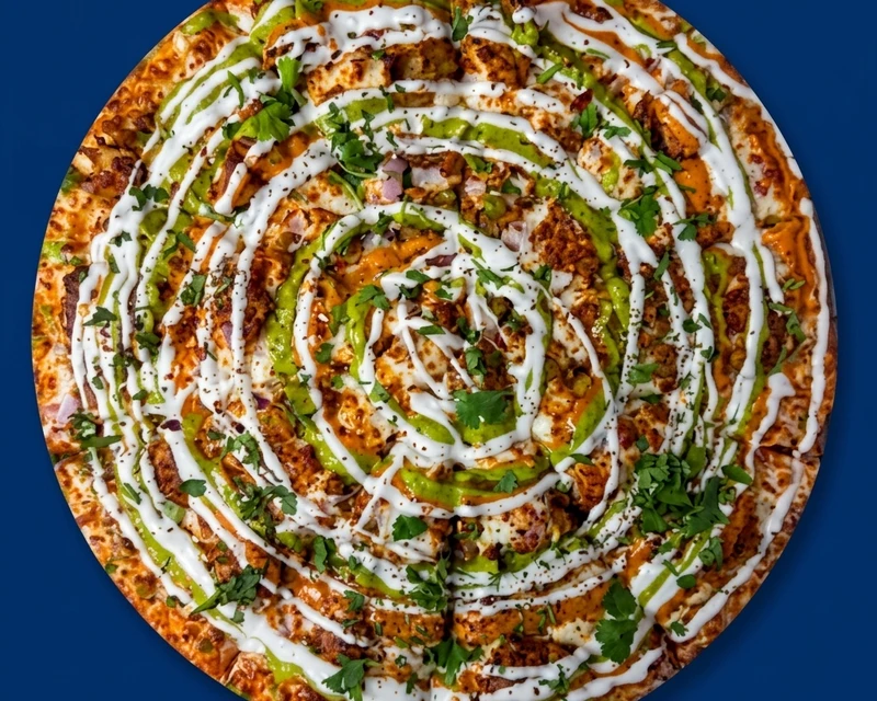 Samosa Chat Pizza with crispy samosas and a desi twist at City South Pizza Winnipeg