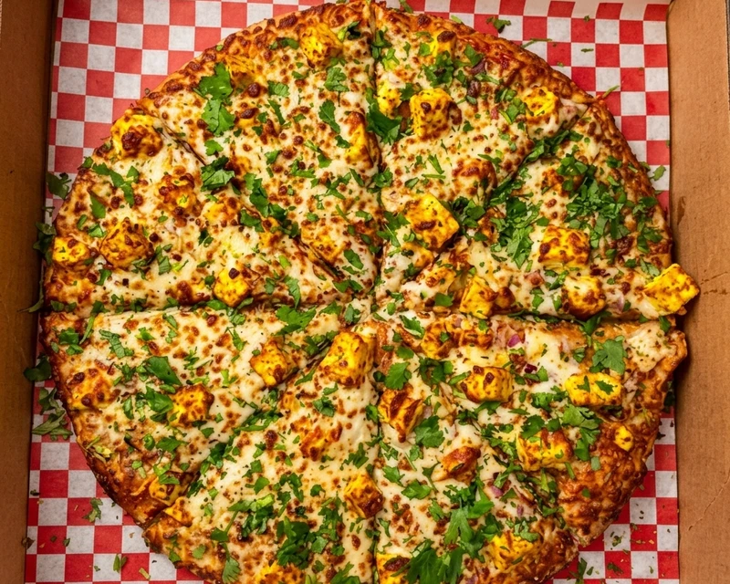 Achari Paneer Pizza at City South Pizza in Winnipeg, MB